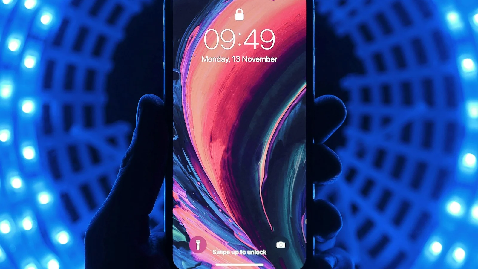 A smartphone lock screen in blue light
